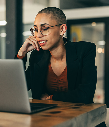 A woman working on a laptop