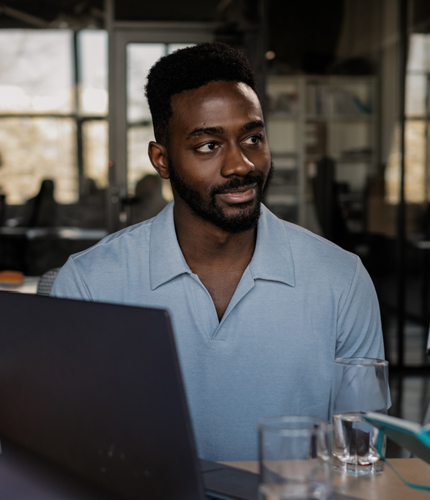 An employee talking with another employee