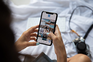 A person on a cellphone on social media