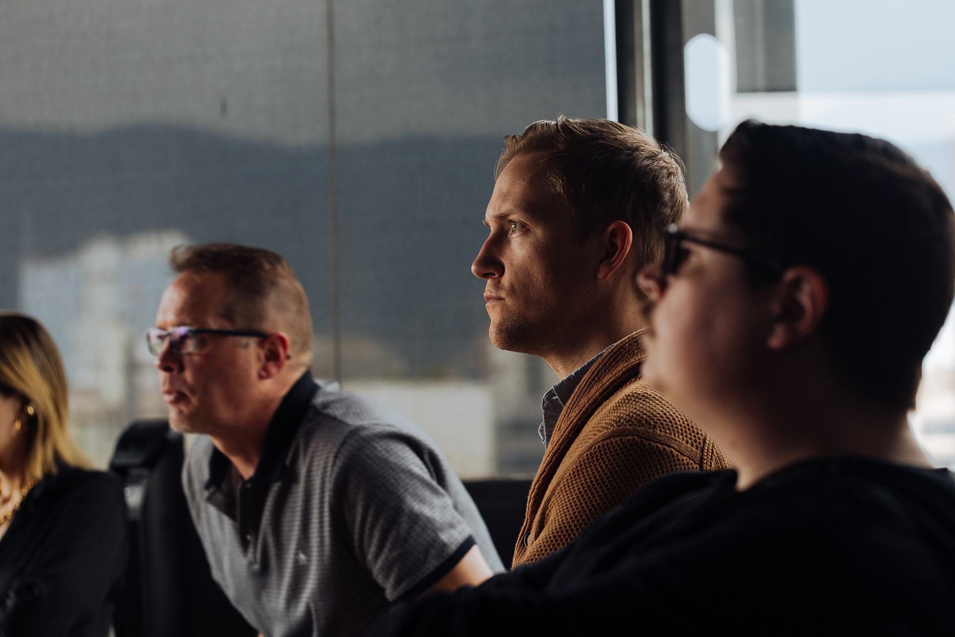 Tech workers listen in on a virtual meeting