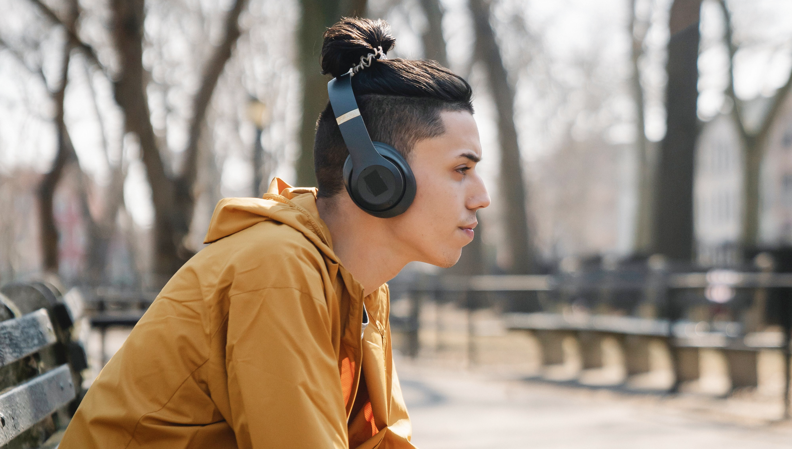 Person wearing over-the-ear headphones