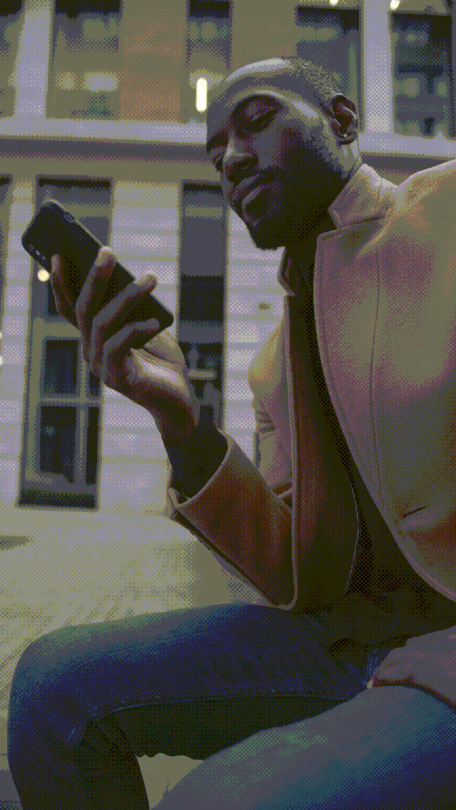 man looking at his phone