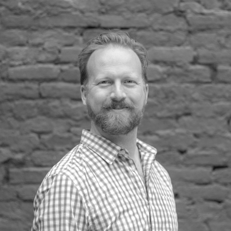 black and white portrait of Michael Neveu