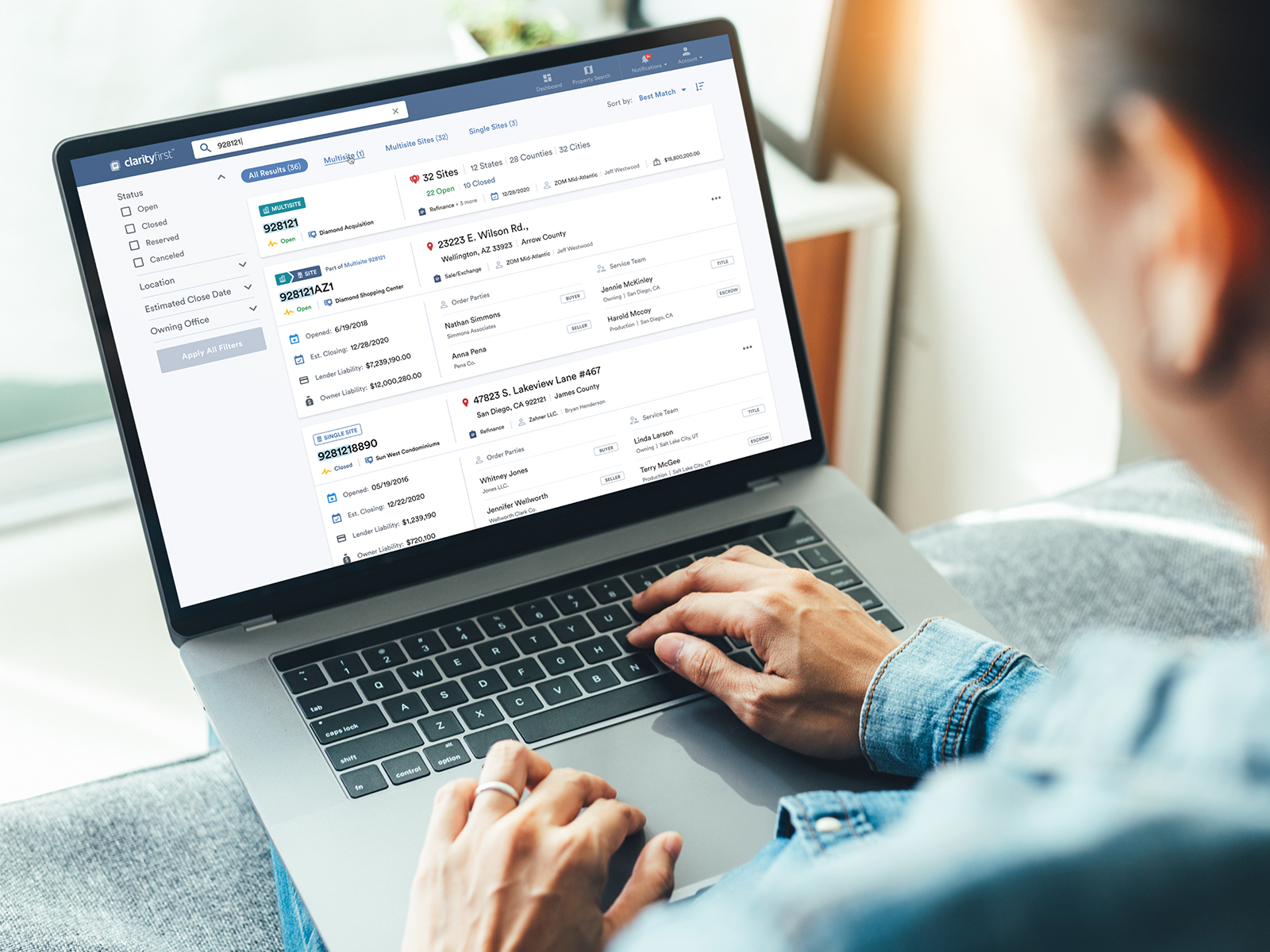 A person using the First American clarity application on their laptop