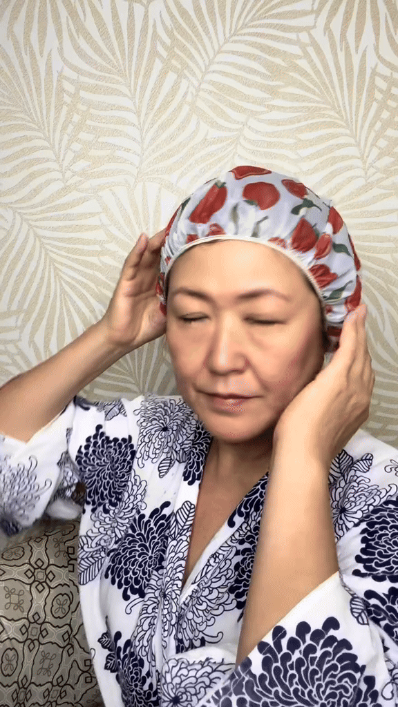 Asian Natura consultant showcasing her hair product