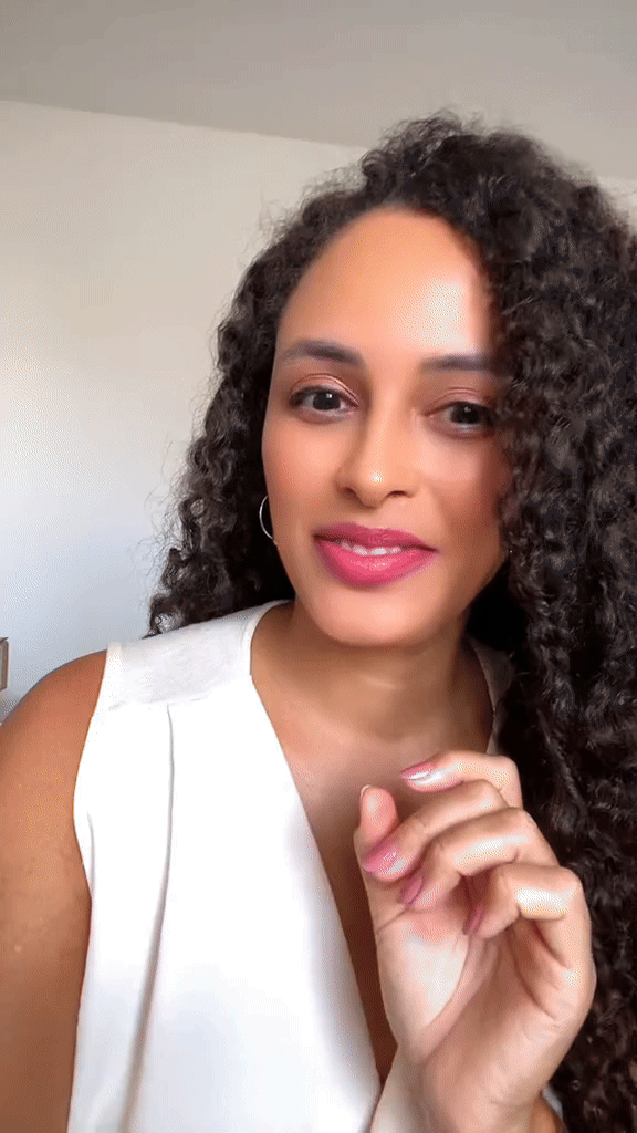 Black woman, natura consultant, talking about a product