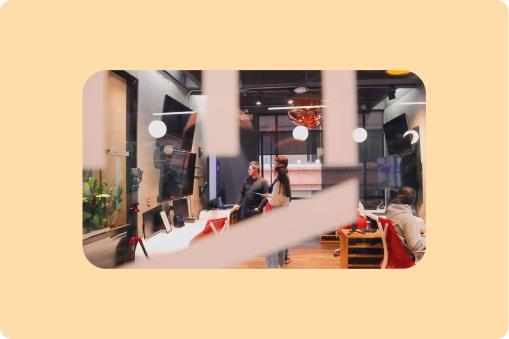 A person sitting at a desk reviewing a website for quality assurance