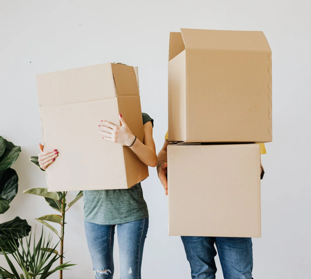 People holding boxes for prime day