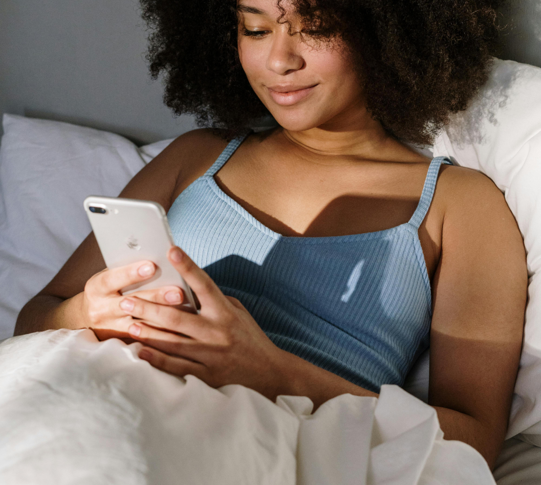 woman in her smartphone