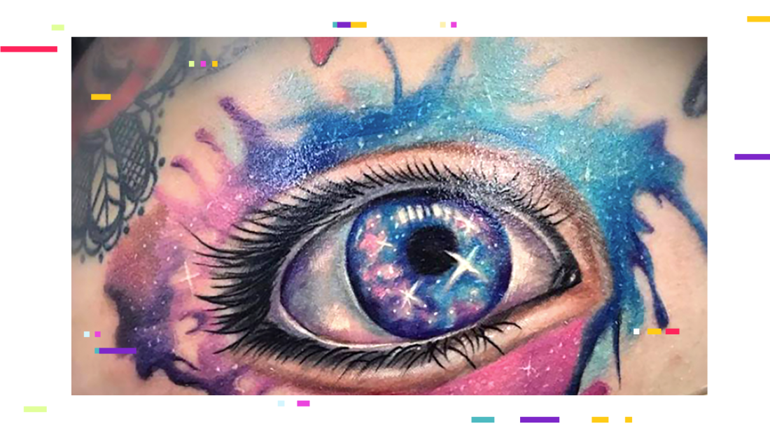 A close up of a colorful eye tattoo