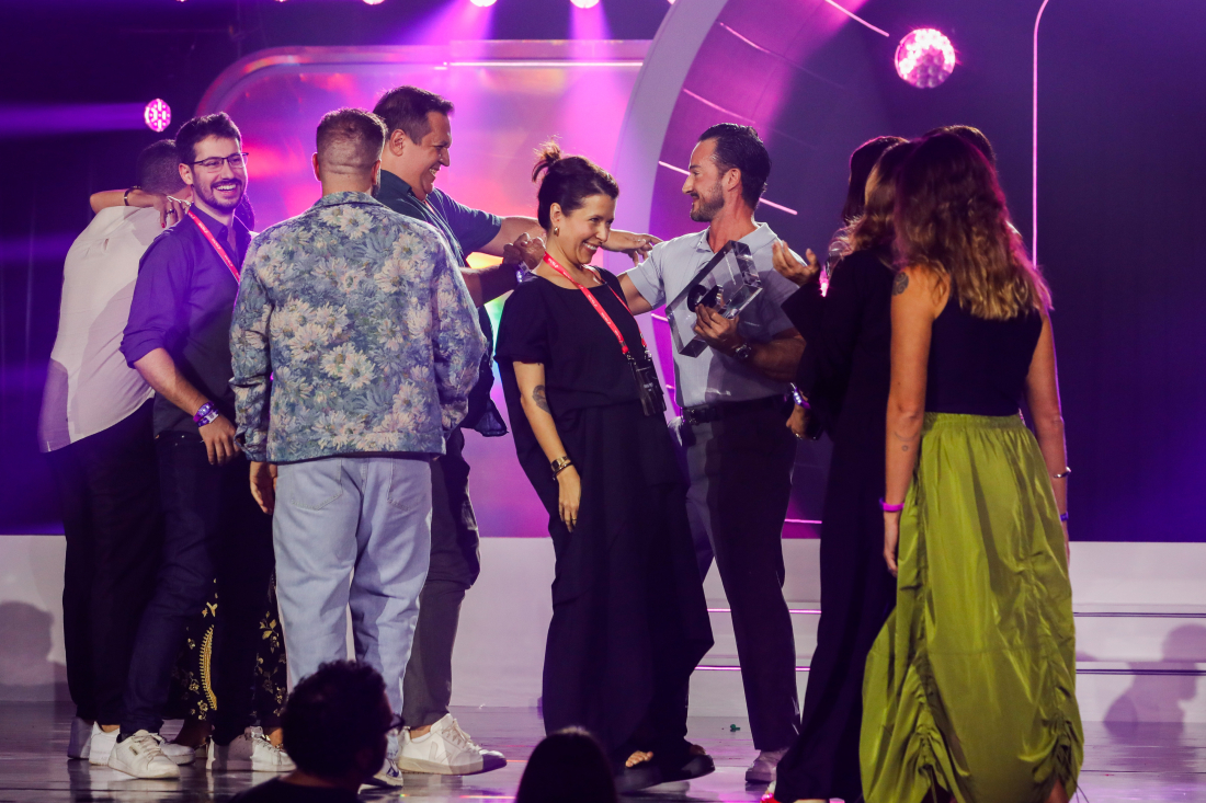 Monks accepting a trophy at TikTok awards