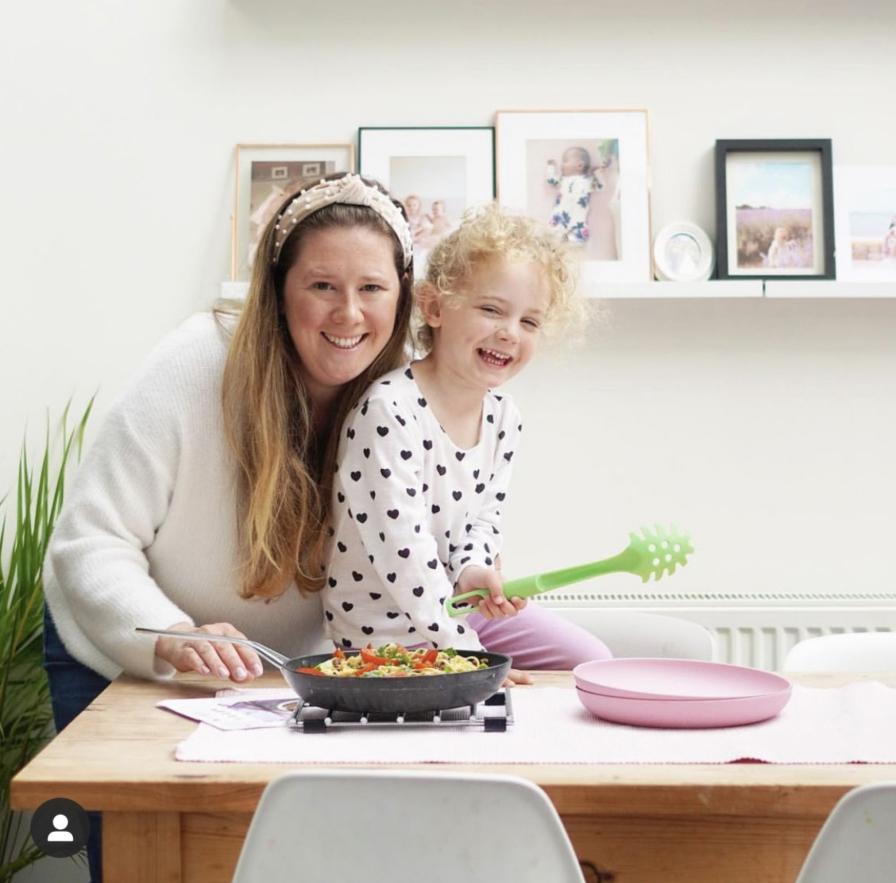 woman with child at table