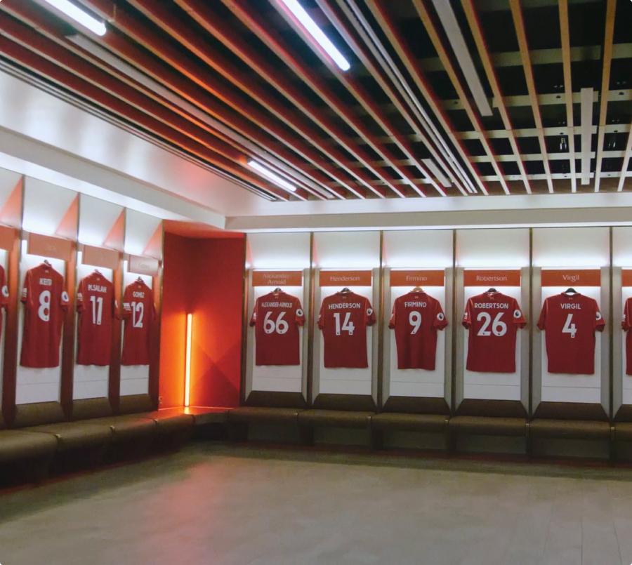 English football locker room with jerseys hanging on the wall