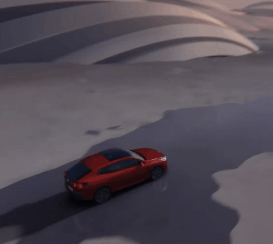 The New BMW X2 is driving through the desert. You see the car from above.