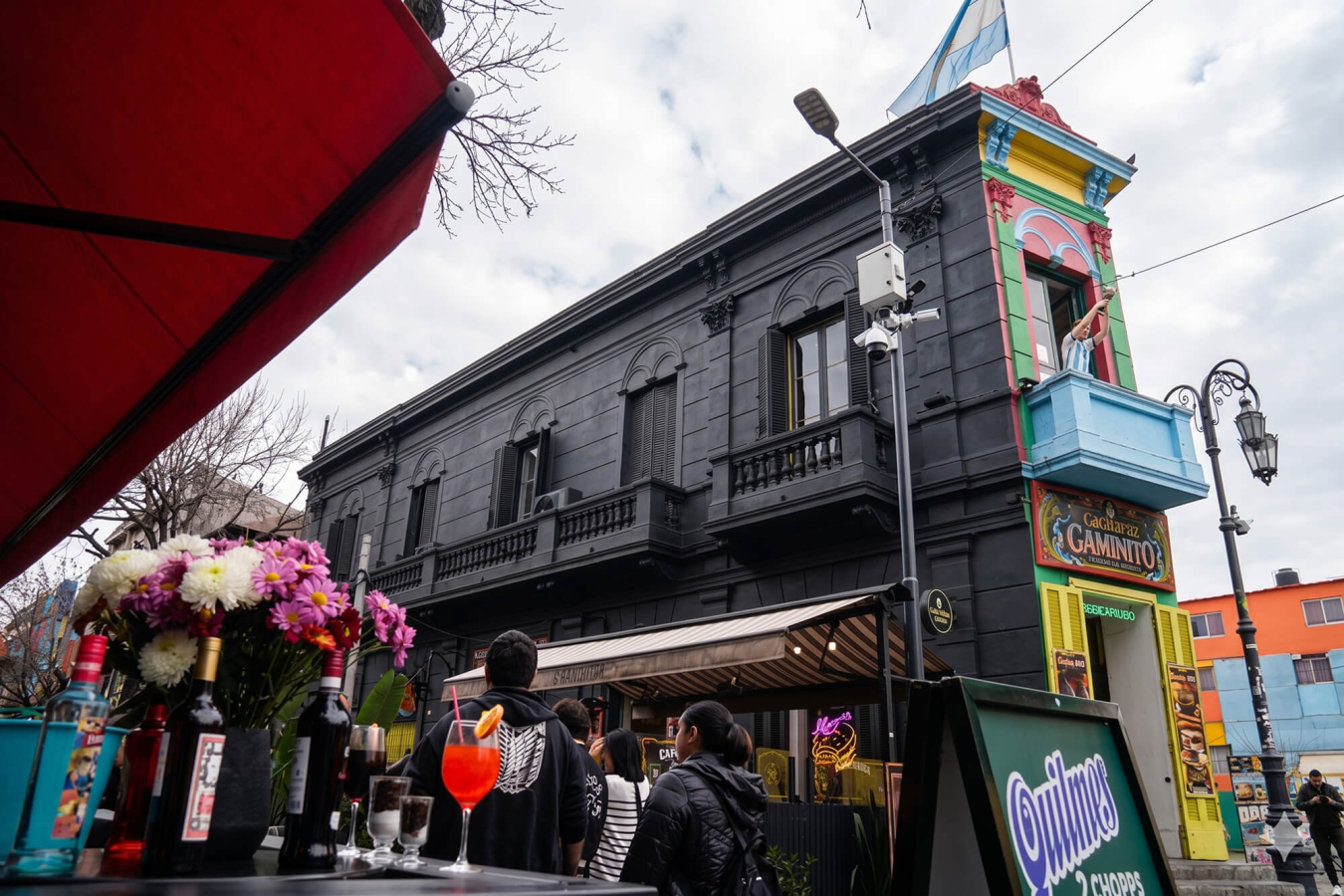 A building in Caminito with the entire facade transformed into a fully black building for the "Darkminito" activation.