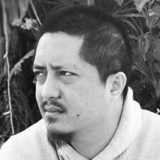 Headshot of John Paite