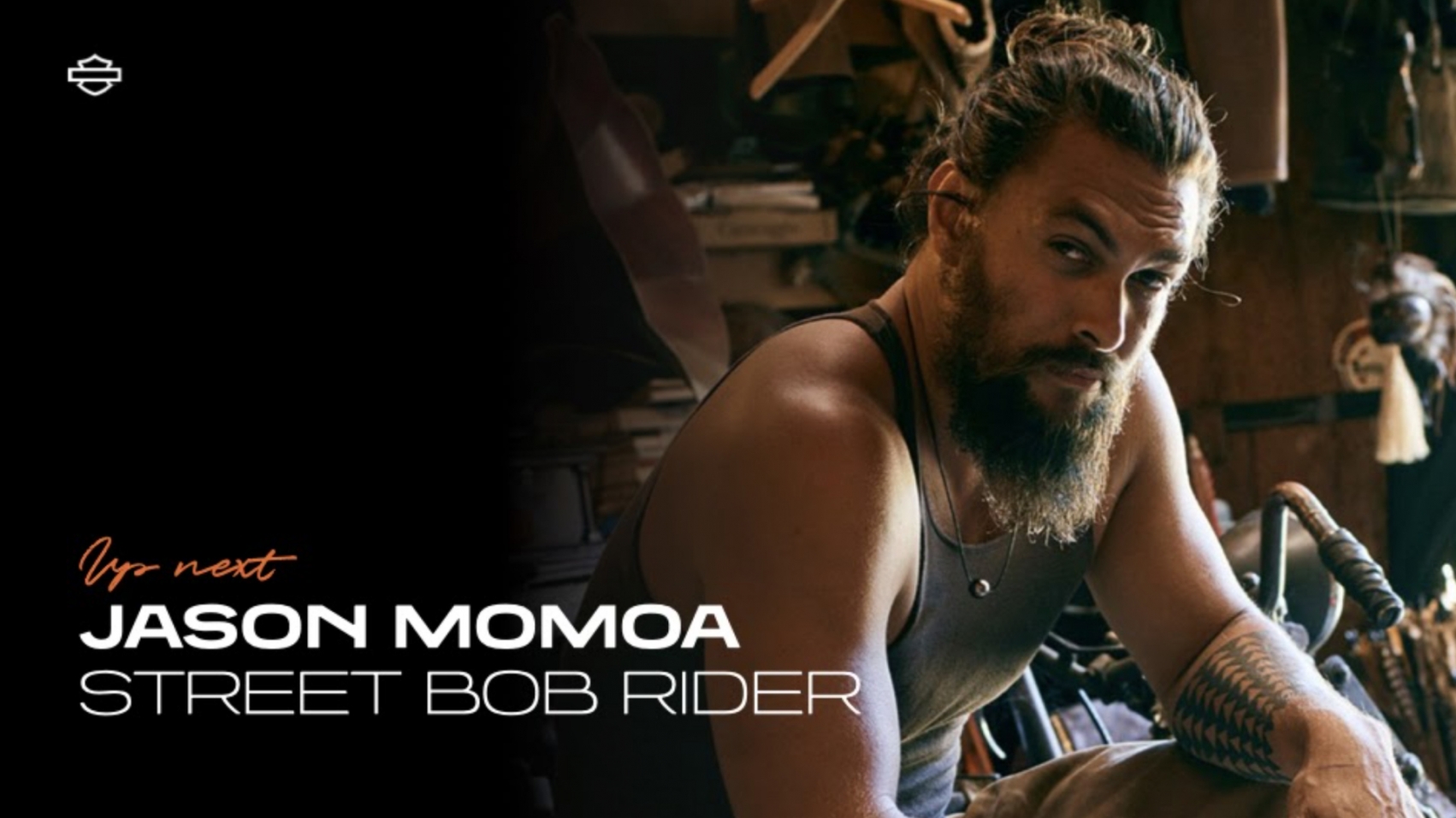 Jason Momoa sits on a Harley