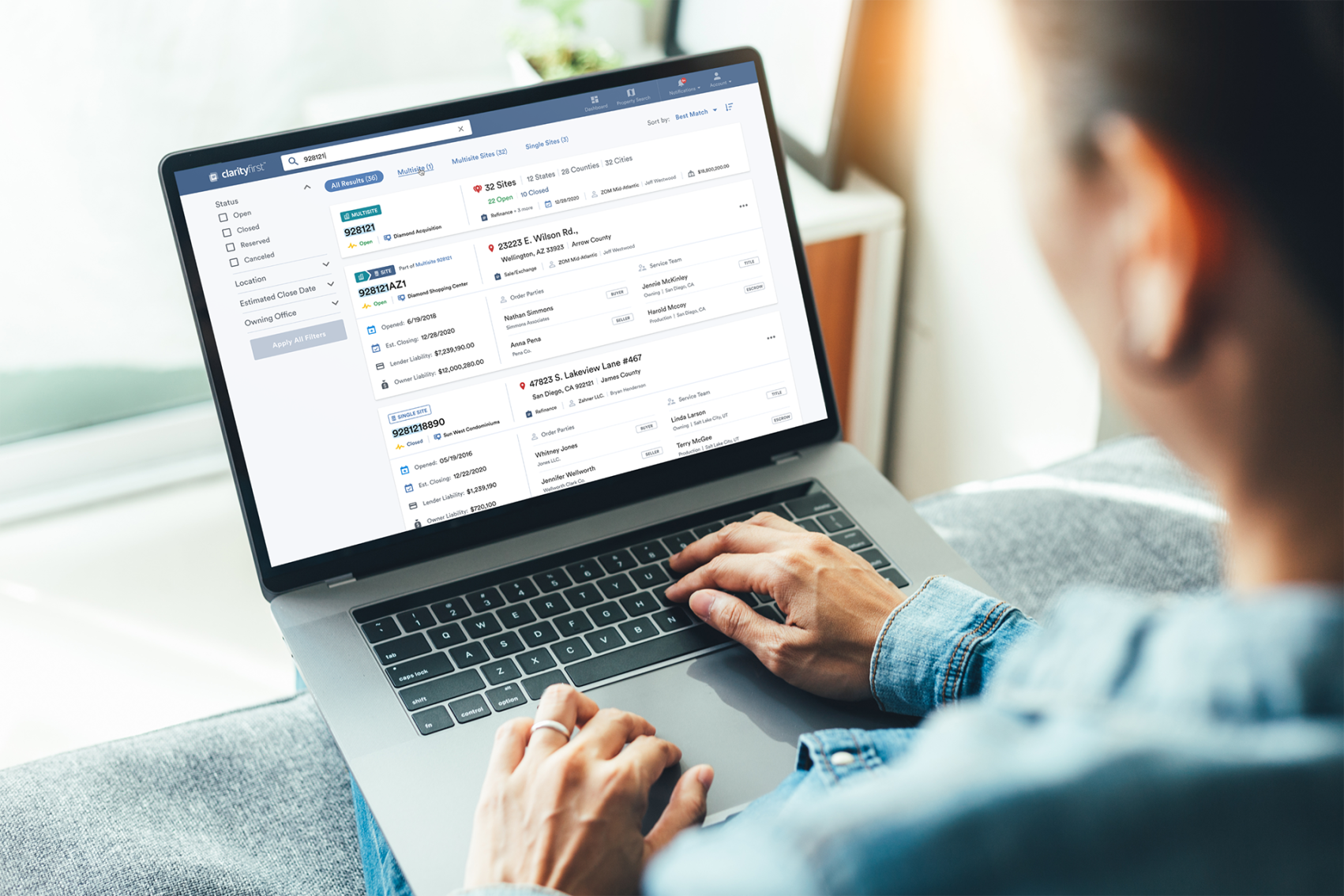 A person using the First American platform on a laptop