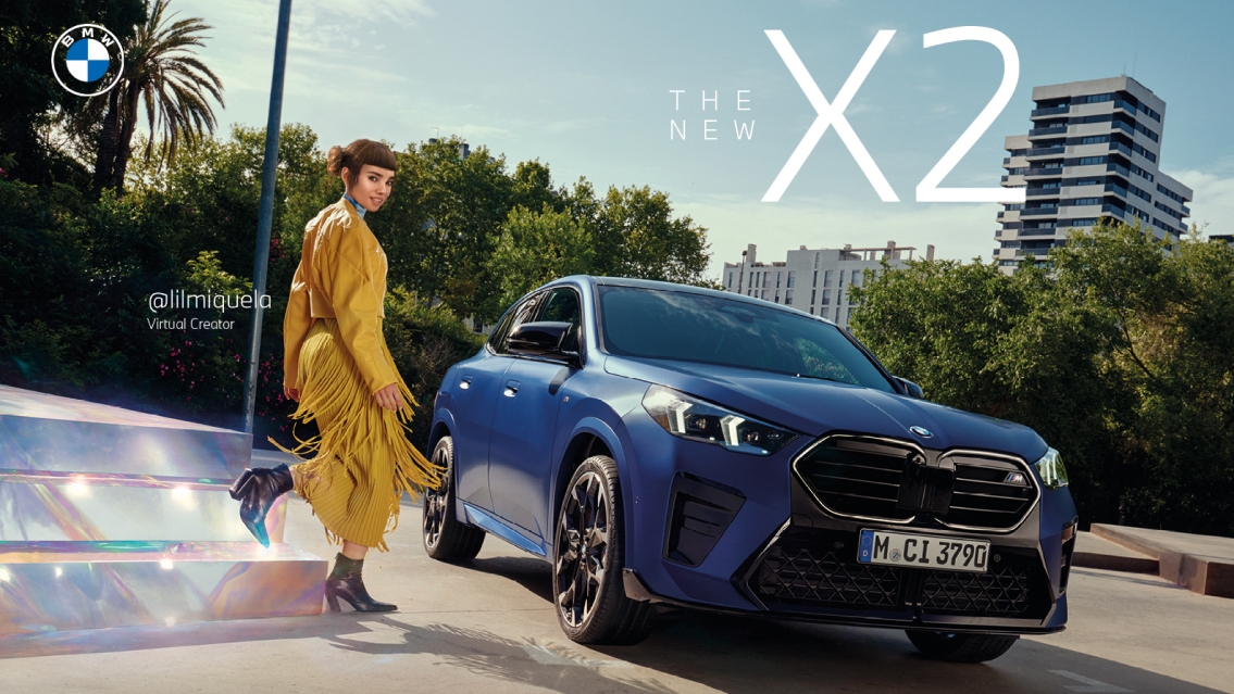 BMW The new X2 car in blue seen from the front. On the left of the car you see Lil Miquela dressed in a yellow skirt and a yellow jacket walking towards the car.