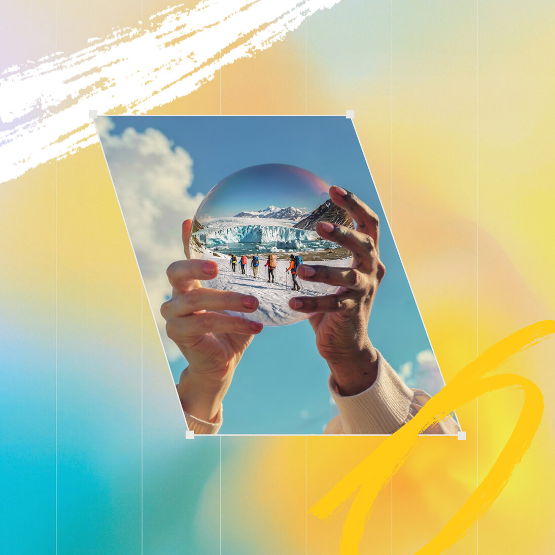 Colorful hands holding a glass orb that has hikers approaching a snow covered glacier within it.
