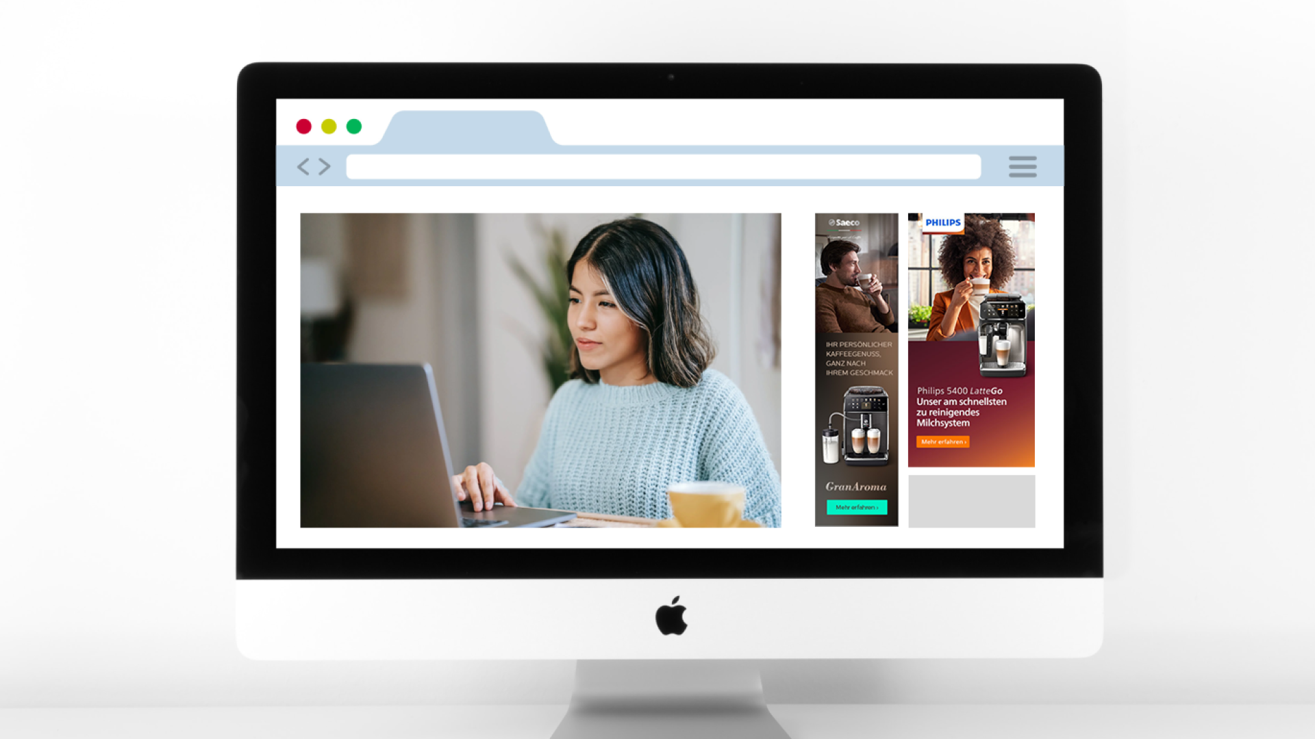 An iMac showing different amazon ads around a web browser