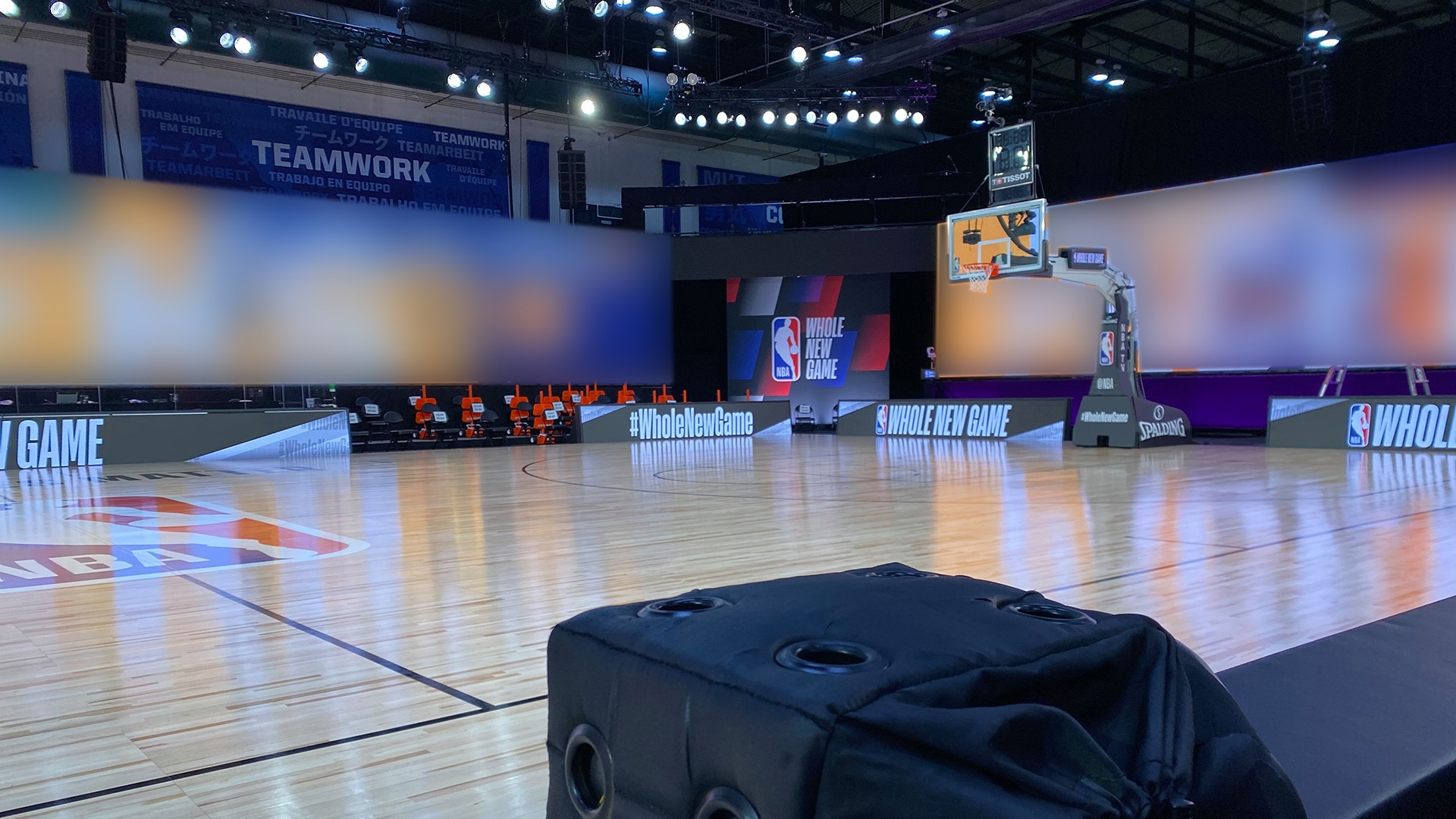 nba basketball court with a camera on the sideline