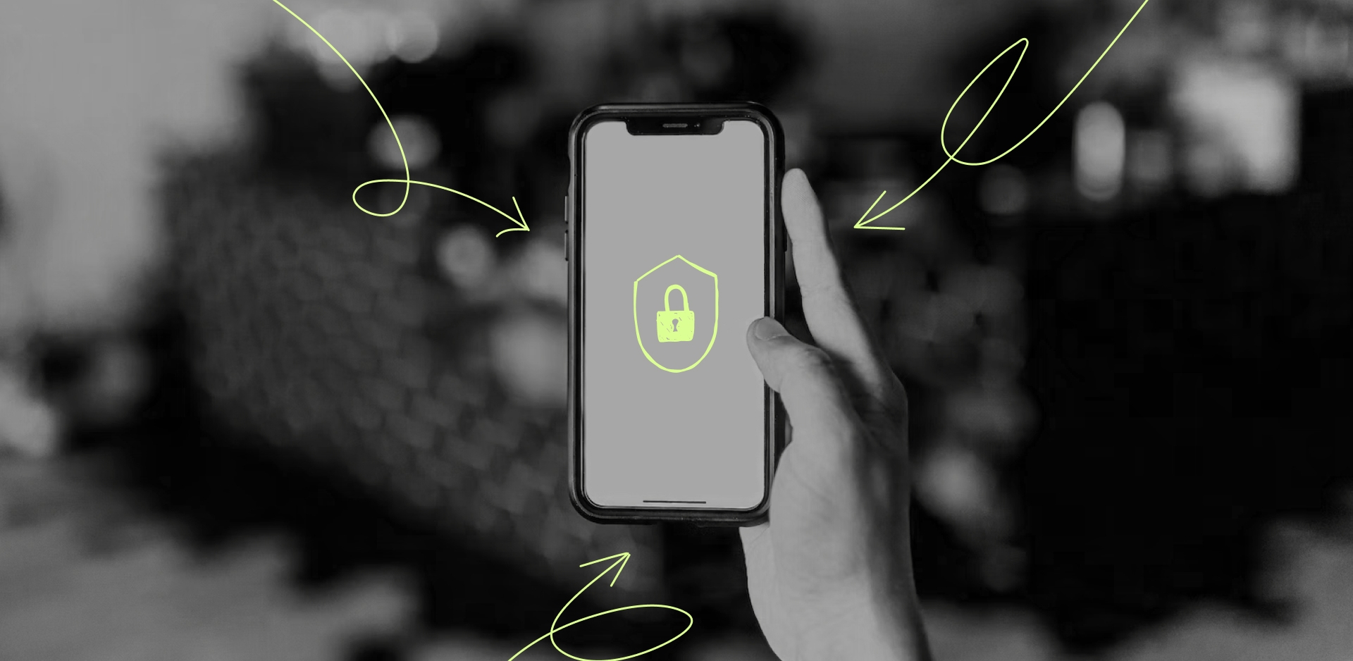A hand holding a cellphone with a lock screen showing