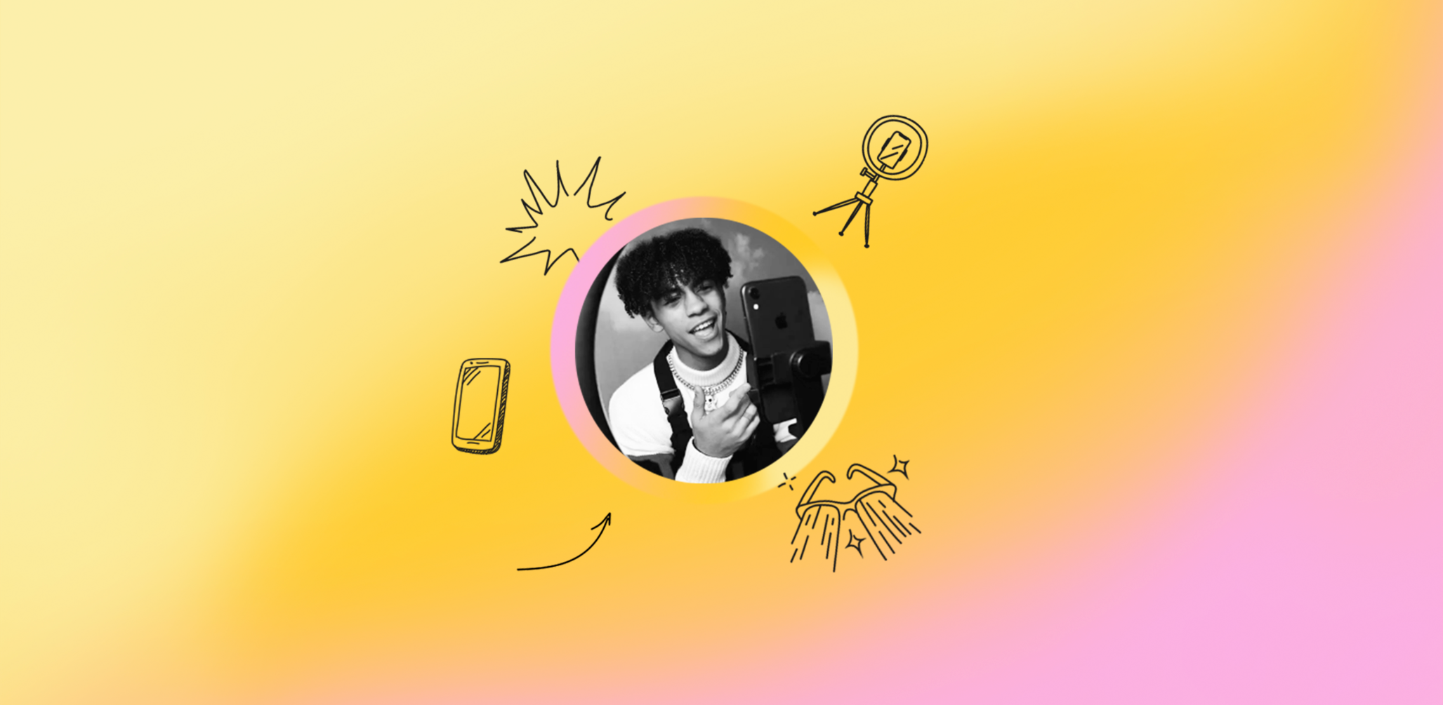 black and white photo of a young guy filming himself on a phone with doodles around the photo