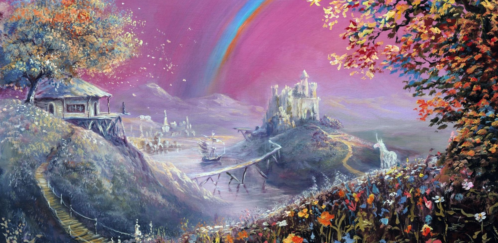 A fantasy land with rainbows and colorful trees
