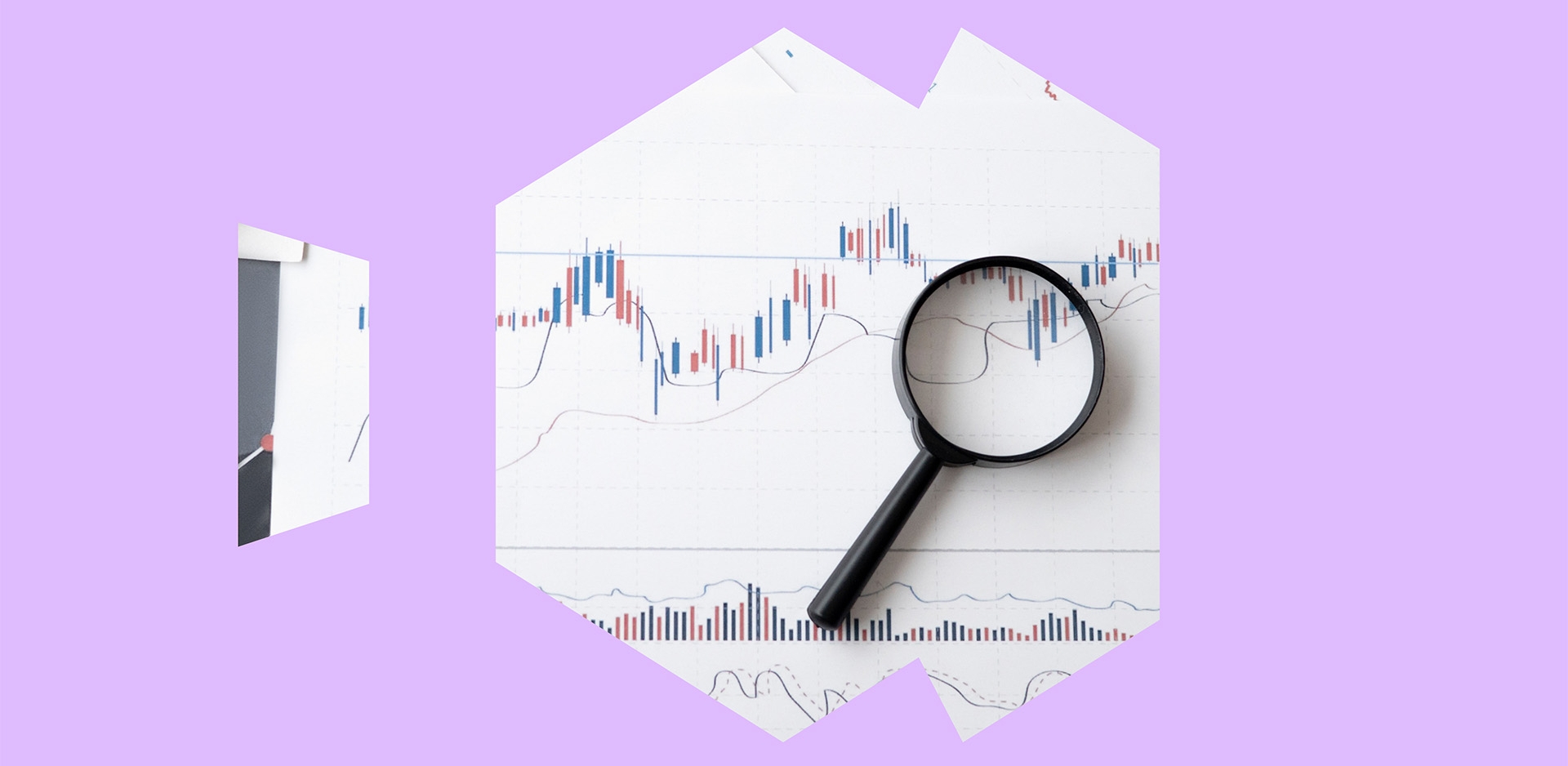 A magnifying glass laying on a graph
