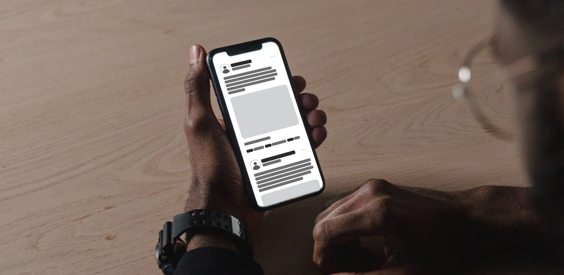 A person using Threads on their iPhone