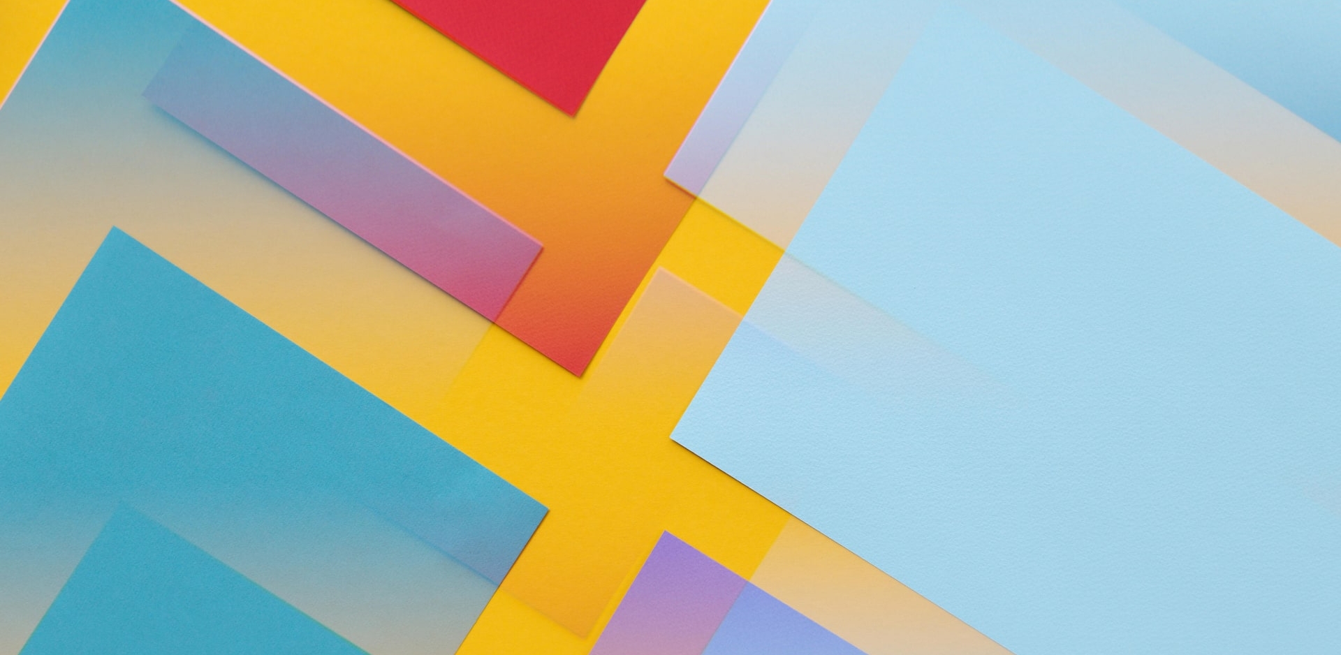 Abstract square shapes in orange and blue tones.