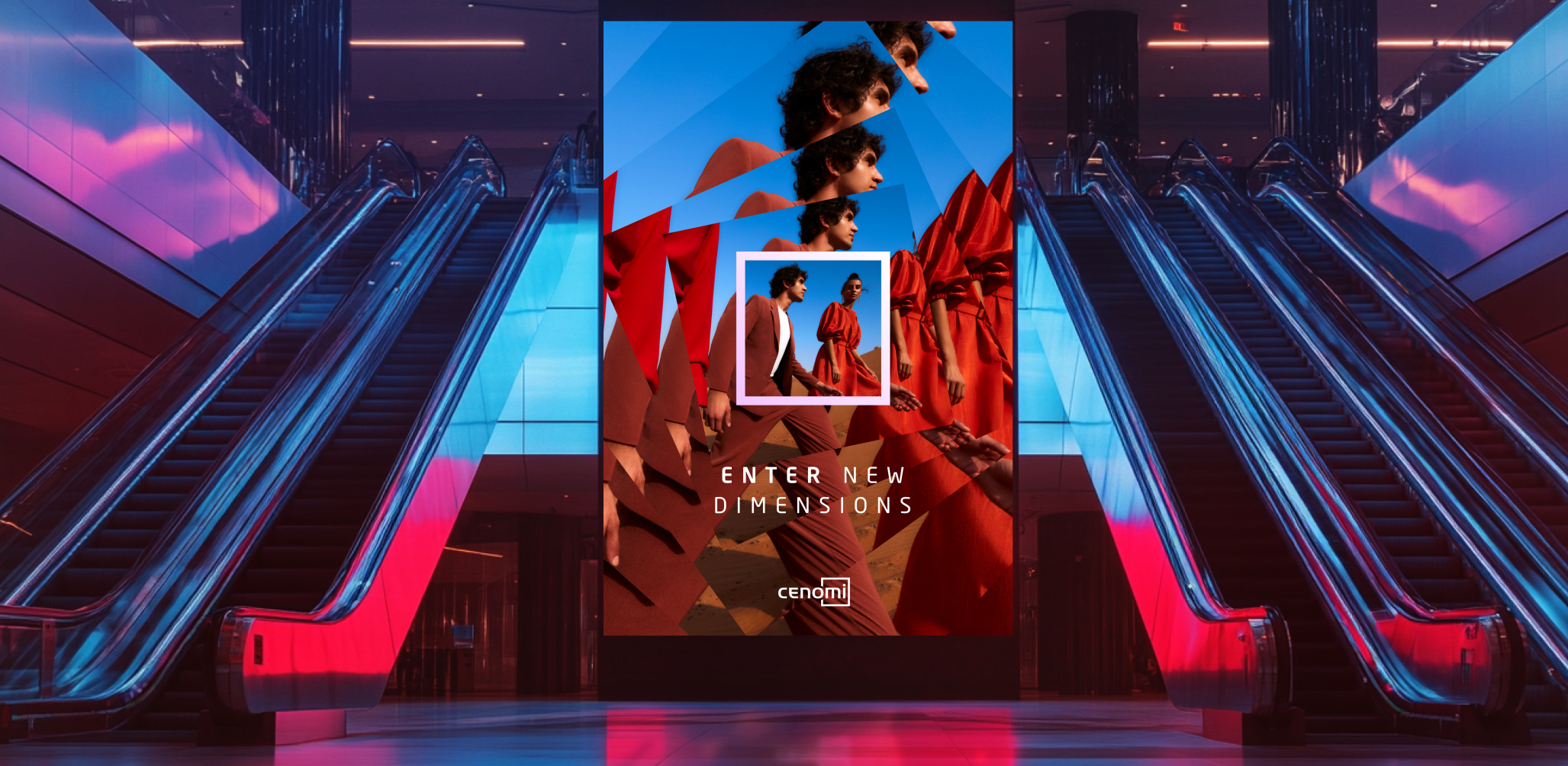 A photo of a digital display ad for Cenomi, featuring a couple in a desert with the copy "Enter new dimensions." Escalators flank both sides of the display, which appears to be in a mall.