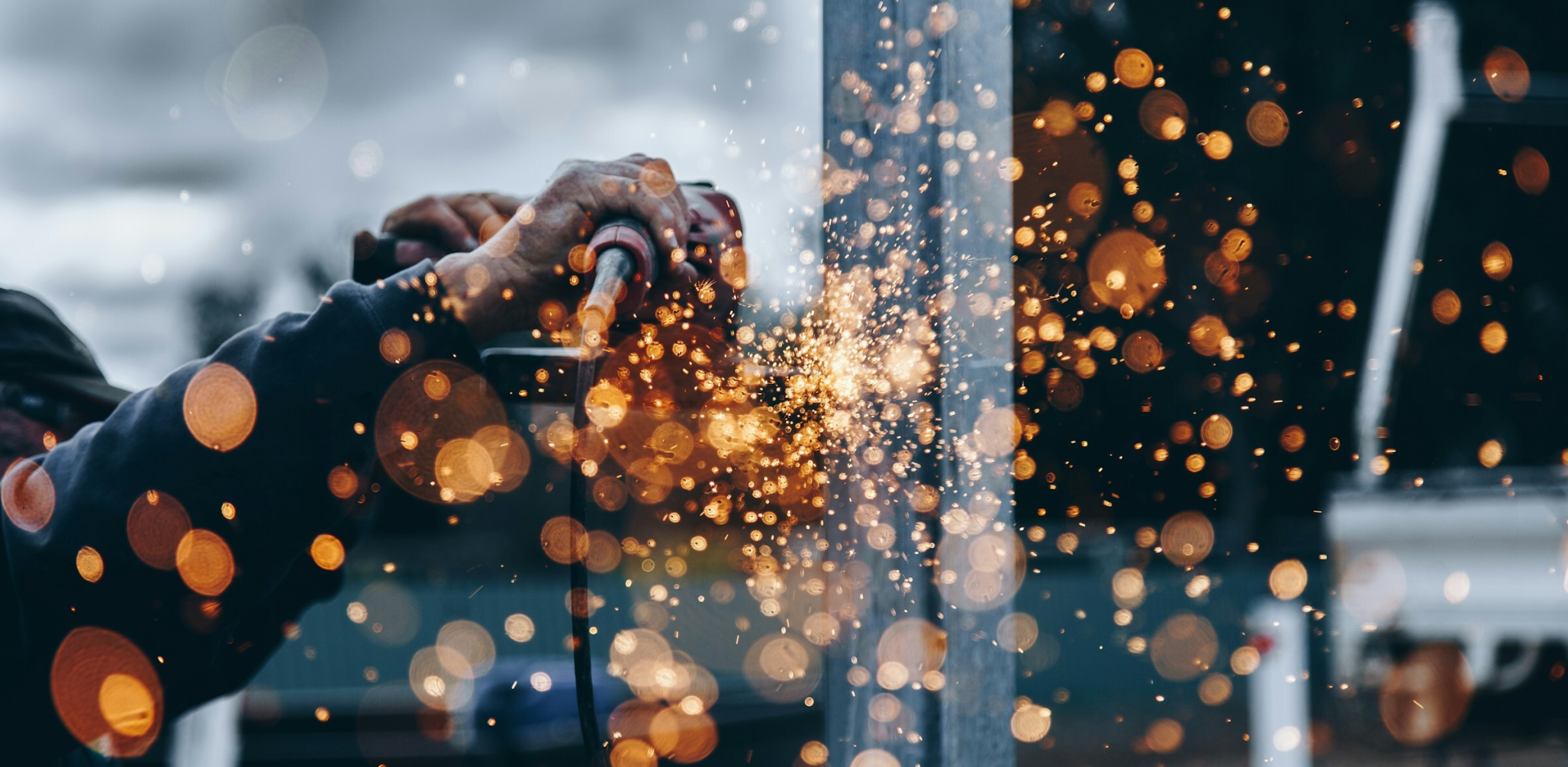 Man using an electric sander
