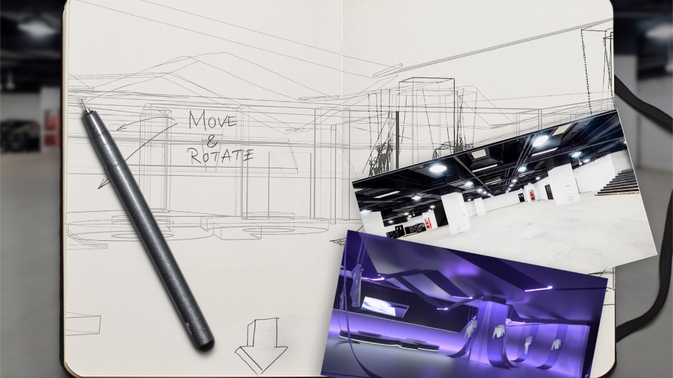 Sketchbook with designs and pen accompanied with a few photos of exhibit