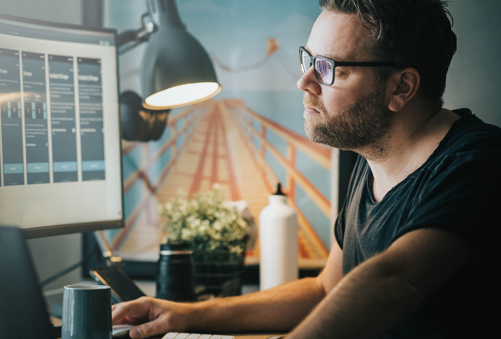 An employee works on their desktop