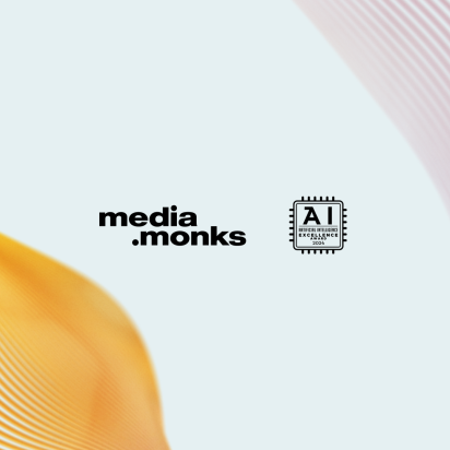 Image featuring the Media.Monks logo and the Business Intelligence AI Award logo.