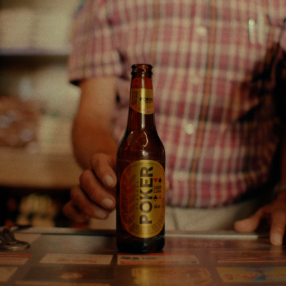 Poker beer bottle on a counter