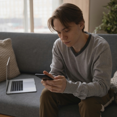 boy in his smartphone