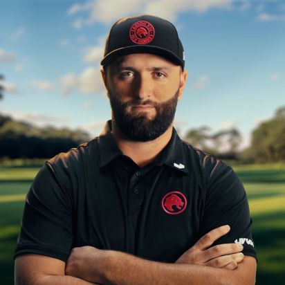 Jon Rahm standing on a golf course