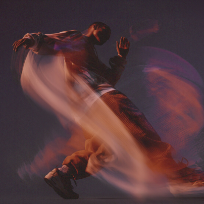 man dancing with swirls around