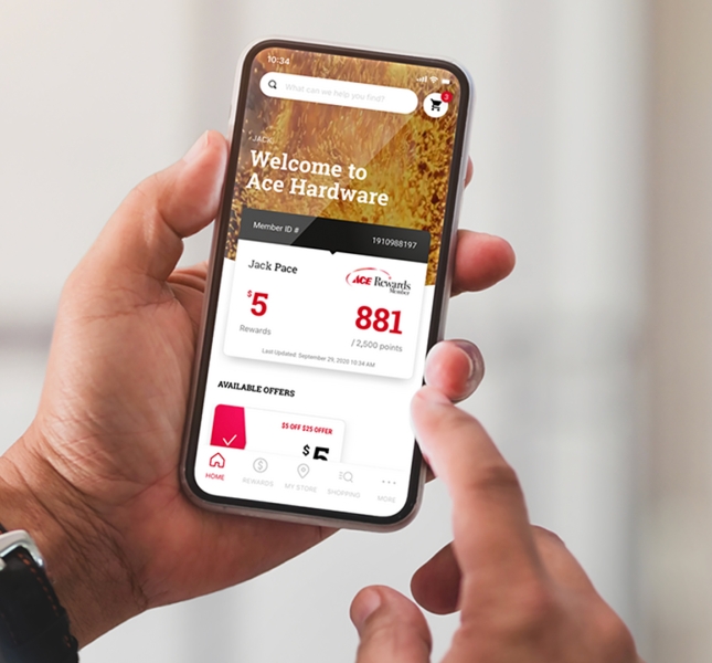 a hand holding a smart phone with the Ace Hardware app on the screen