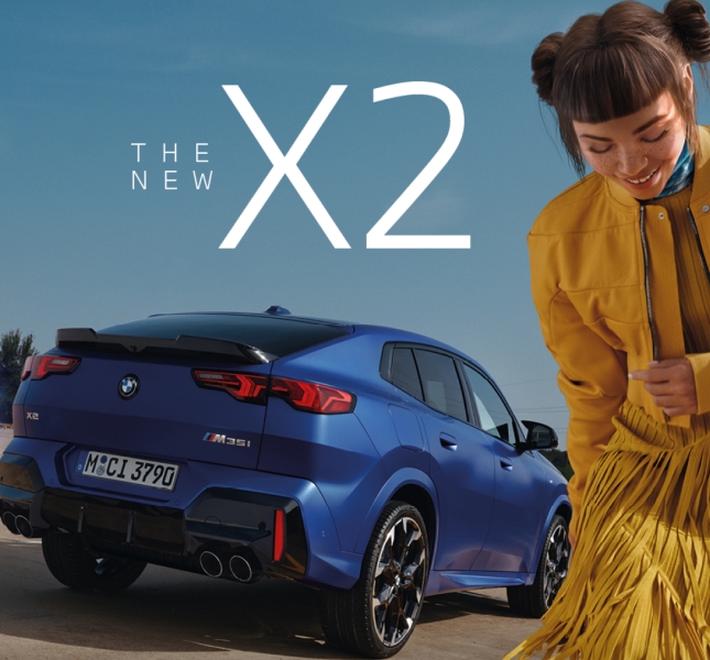 BMW The new X2 car in blue seen from the back. In front of the car you see Lil Miquela dressed in a yellow skirt and a yellow jacket.