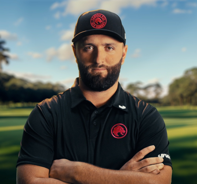 Jon Rahm standing on a golf course