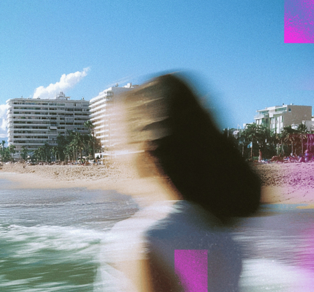 A blurred woman running on the beach