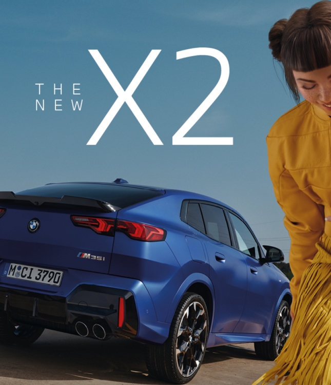 BMW The new X2 car in blue seen from the back. In front of the car you see Lil Miquela dressed in a yellow skirt and a yellow jacket.