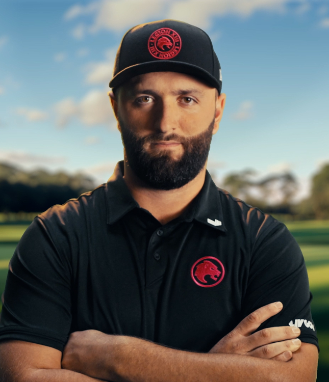 Jon Rahm standing on a golf course