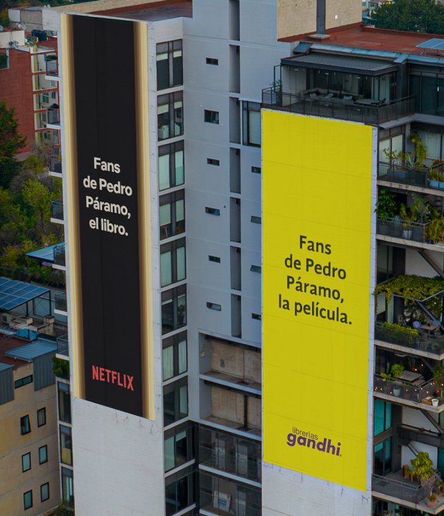 The image features two large billboards on buildings, one advertising a book titled "Pedro Páramo" associated with Netflix, and the other promoting the film adaptation of the same title.