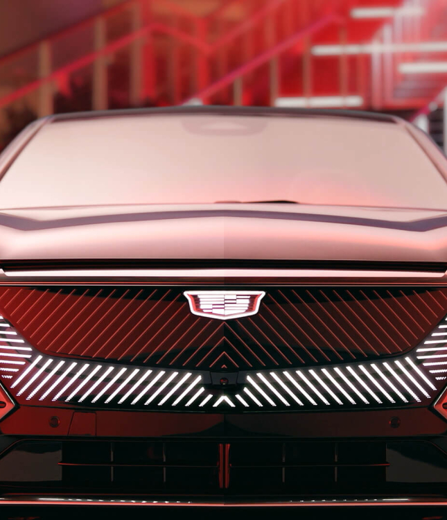 Cadillac LYRIQ still image with a red hue of lighting