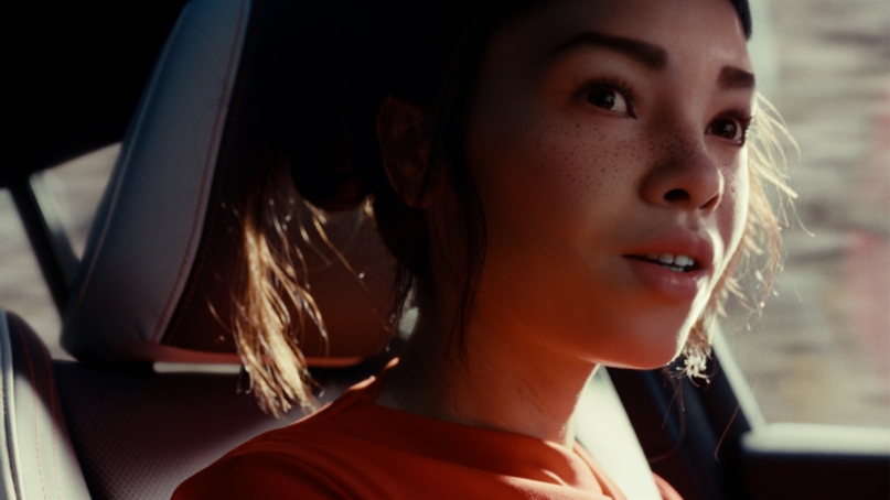 Closeup from Lil Miquele while she is driving in the BMW X2.